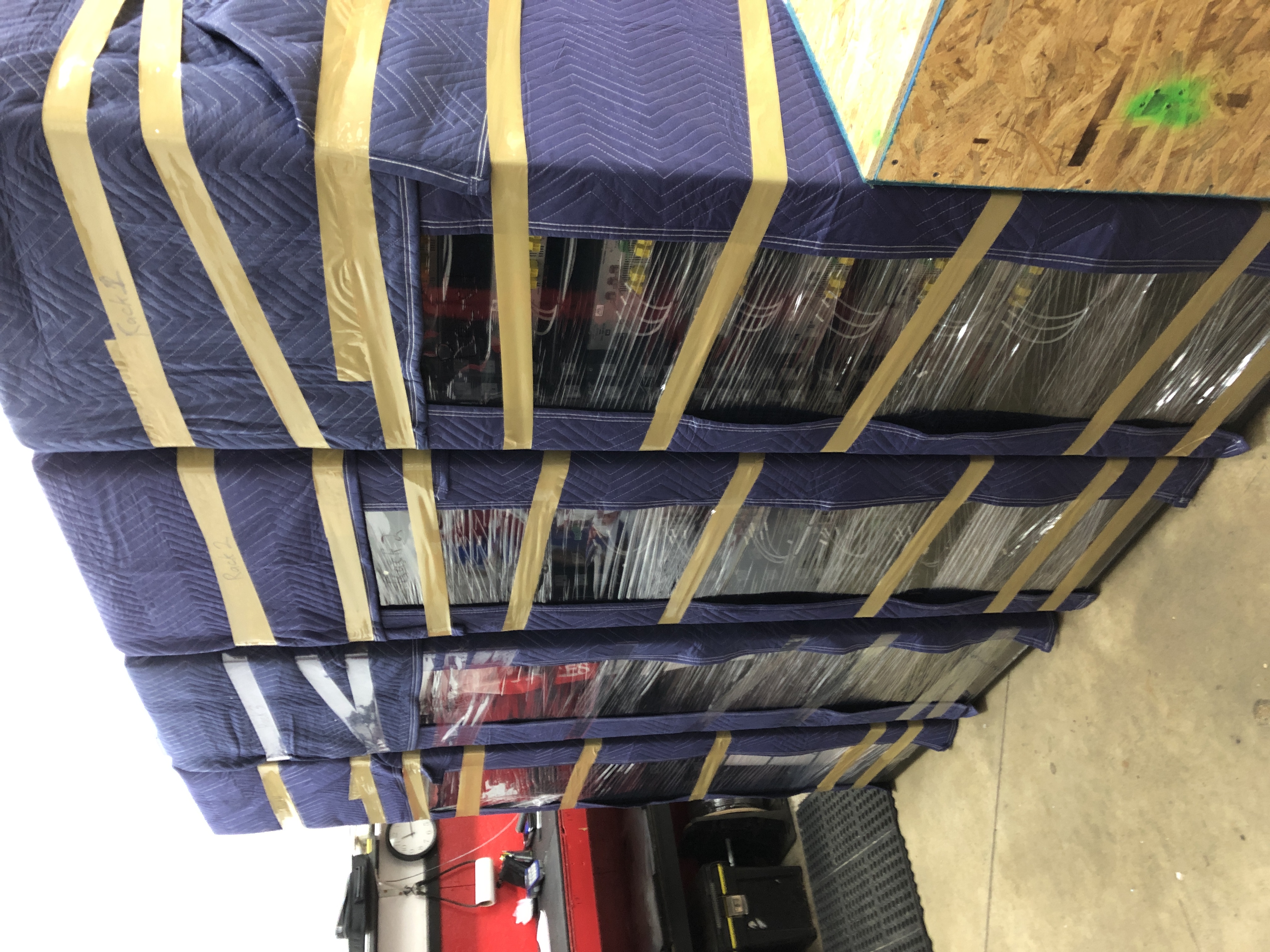Racks lined up in transport blankets